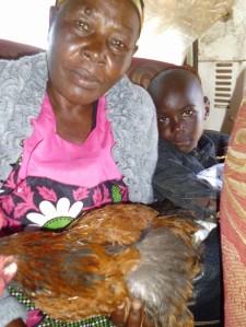 We thought getting into a matatu with plastic sheet was impressive until this lady succeeded with a chicken. 